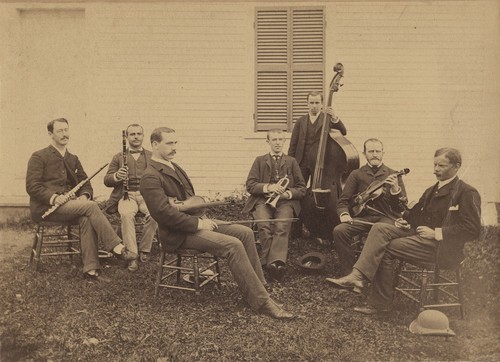 1883 band sitting outdoors - sitting,