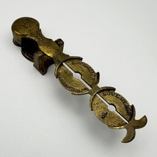 ANTIQUE BRASS SOVEREIGN COIN