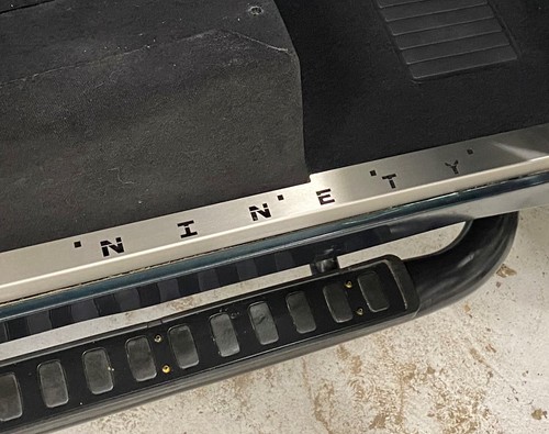 Front door carpet retainer - front,