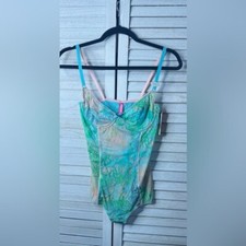 Cosmopolitan Tropical Mesh Bodysuit. Snaps at bottom. Size M. NWT