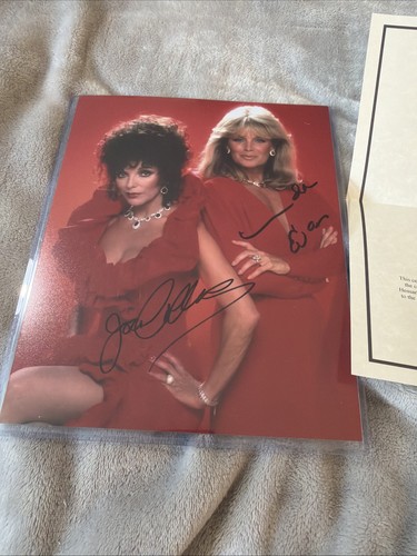 Joan collins signed person - in,