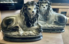 Pair Of Antique Recumbent Staffordshire Lions. Rarer Grey.