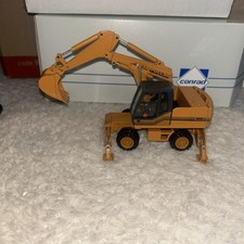 Conrad 2899/01 Case 988plus Wheeled Power Slide Excavator, 1:50, BNIB