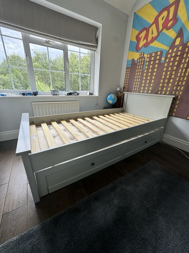 Grey single bed with - , a