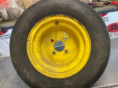 Stud wheel and smooth tyre - and,