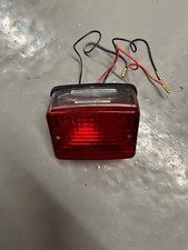NEW OLD STOCK REAR TAIL LIGHT BRAKE LIGHT NO BRAND - NO MODEL OF BIKE