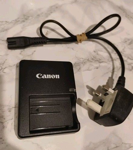 Genuine canon charger e5e - genuine,