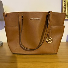 Michael Kors Jet Set brown leather tote bag shoulder strap handle zip close