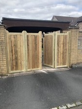 Tanalised solid boarded bi-folding driveway gates 8ft Wide X 4ft High
