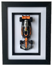 Bburago 1/43 F1 Mclaren MCL60 #4 Lando Norris 2023 model in a black frame #38087