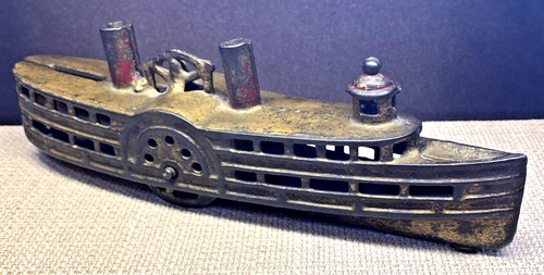 Antique cast iron paddle steam - cast,
