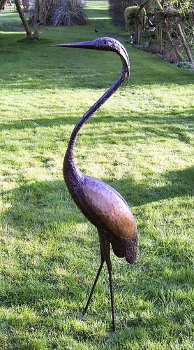 Metal black headed herons - black,