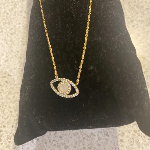 Gold and white stone - evil, eye