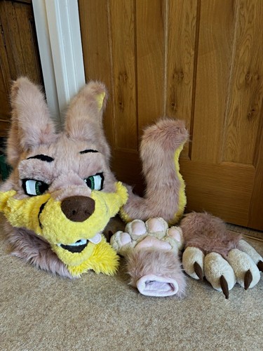 Pink and yellow wolf fursuit
