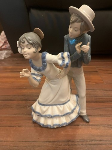 Nao lladro figurine - by,