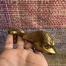Vintage brass fish door