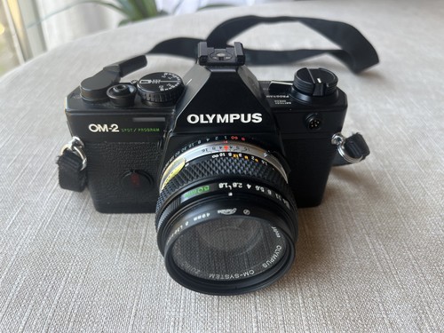 Olympus 35mm slr - om-2, +