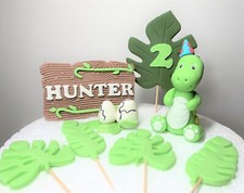 Dinosaur fondant cake topper