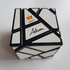 Mefferts Ghost Cube twist puzzle Adam brain teaser white hand held game