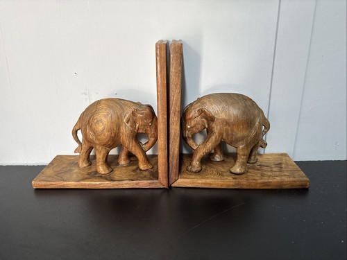 Wooden carved elephant - elephant, book