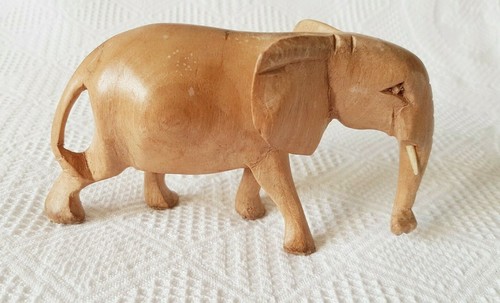 Carved wooden elephant hand - elephant,