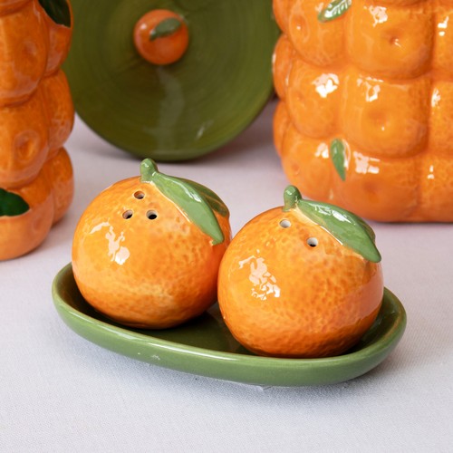 Orange salt and pepper shakers - and,