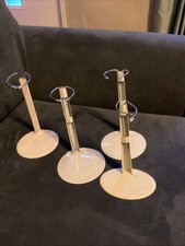 Adjustable White Metal Doll