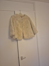 A Faux Fur Shrug  Cream  by