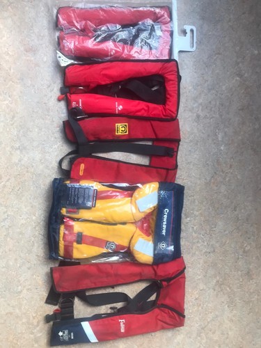5no life jackets - ,, three
