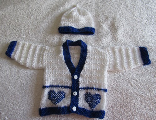 Hand knitted cardigan hat in - &,