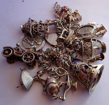 Vintage Georg Jensen solid silver charm bracelet  many silver charms incl moving