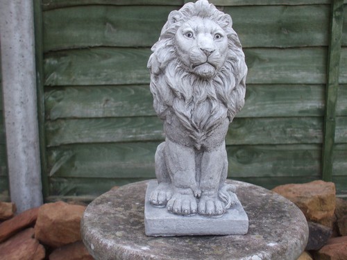 Sitting stone lion - stone,
