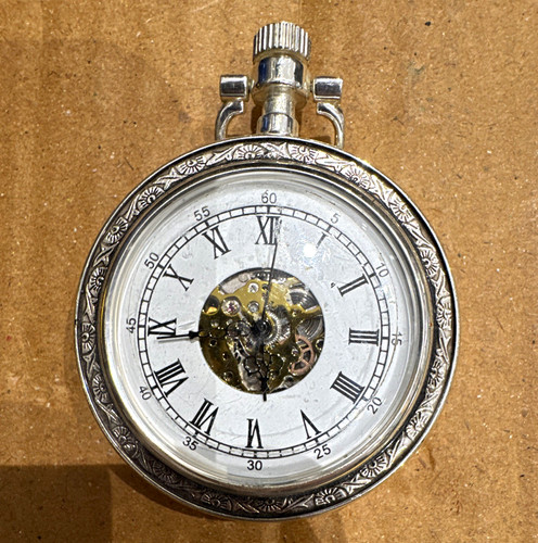 Silver open face skeleton - open,