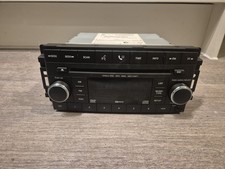 Voyager Grand Chrysler 2008-14, Audio System CD Radio Head, 05064925AG