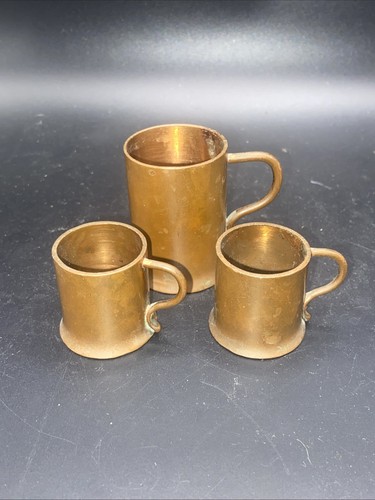 Three vintage copper measuring - three,