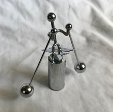 Vintage Rocking Kinetic Skier desk toy late 1970s early 1980s balancing metal