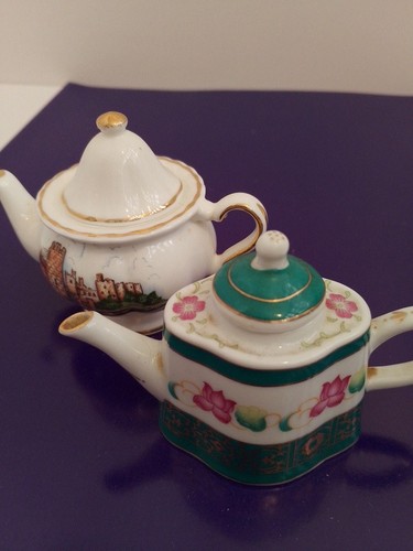 Two small vintage teapots in - two,