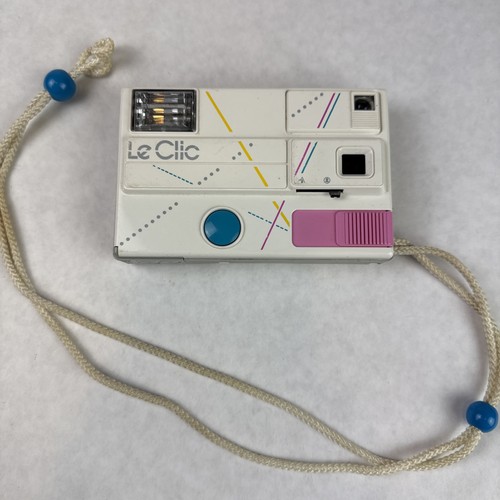 Vtg clic camera - le,