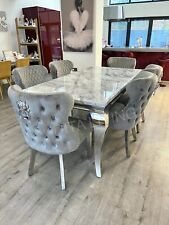 marble dining table + 6 Button back velvet lion knocker chairs