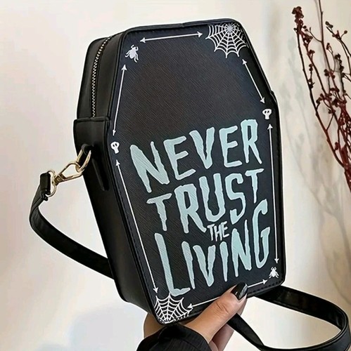 Never trust the - never, coffin