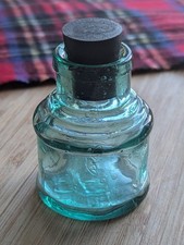 Vintage aqua blue glass bottle