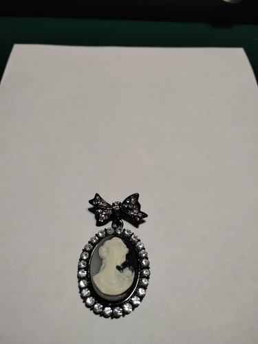 Cameo brooch with black and - cameo,