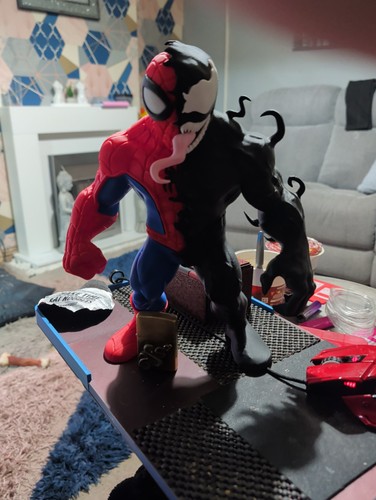 Venomised spider figure - spider,