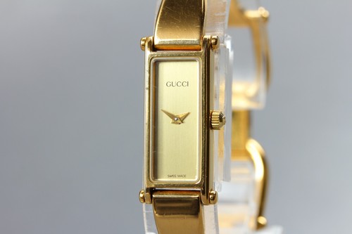 Gucci 1500l gold dial quartz - gold,