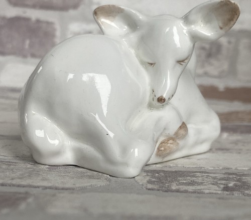 Sleeping deer figurine - sleeping,