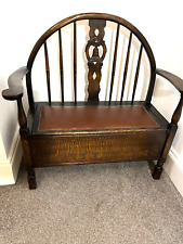 Antique carved wooden cartwheel back settle bench