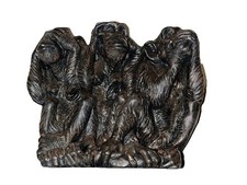 Three Monkeys doing See No