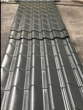 Tile effect roofing sheets