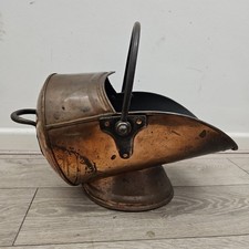An antique helmet shaped coal scuttle  Lee & Wilkes Ltd 1922 Broad Arrow Mark