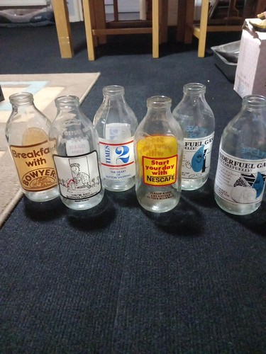 Advertising milk bottles - advertising,